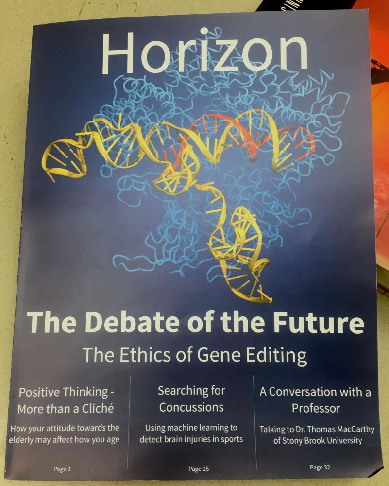 Science teacher and Harker Horizon adviser Chris Spenner's classroom copy of the first issue of Harker Horizon rests on a textbook. The issue, released last week, features science writing from current and past upper school students.