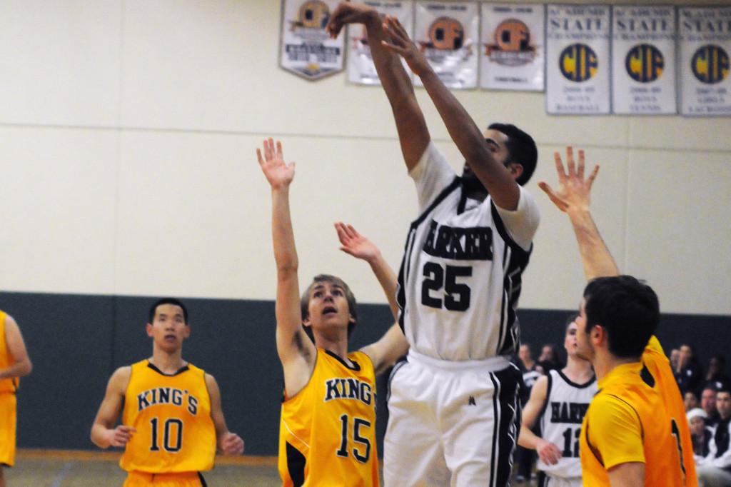 Varsity boys' basketball defeats The Kings Academy in dramatic overtime game