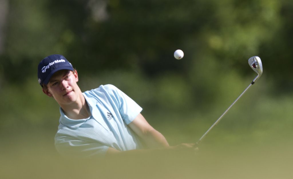Maverick McNealy plays his third shot on the 12th hole as seen during the third round of match play at the 2012 U.S. Junior Amateur at Golf Club of New England in Stratham, N.H. on Thursday, July 19, 2012. 