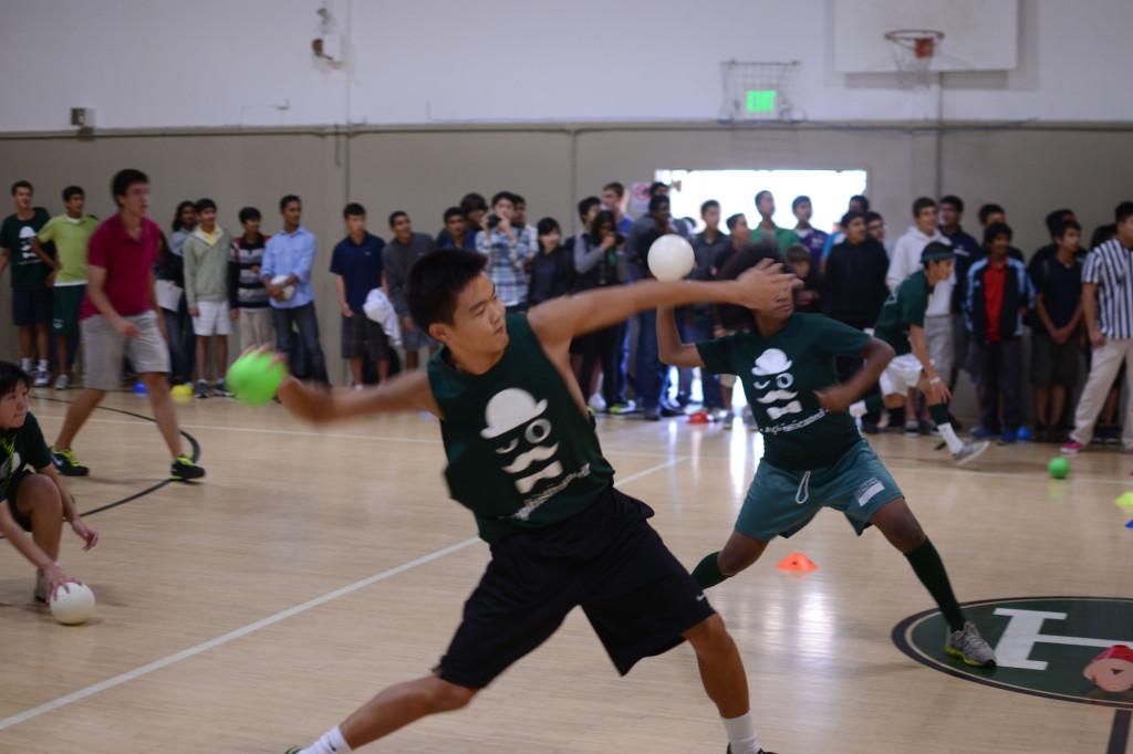 Junior Sean Pan throws a dodgeball at the sophomore team in hopes of claiming victory for his class. On Wednesday, September 19, the seniors and juniors triumphed over the freshmen and sophomores, respectively.