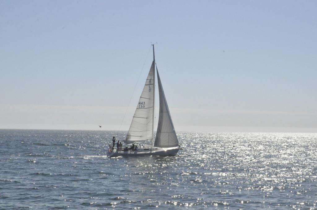 A sailboat commandeered by juniors drifts along the waters in Santa Cruz. The junior class advisories either went kayaking or sailing for their trip on Monday, October 1. 