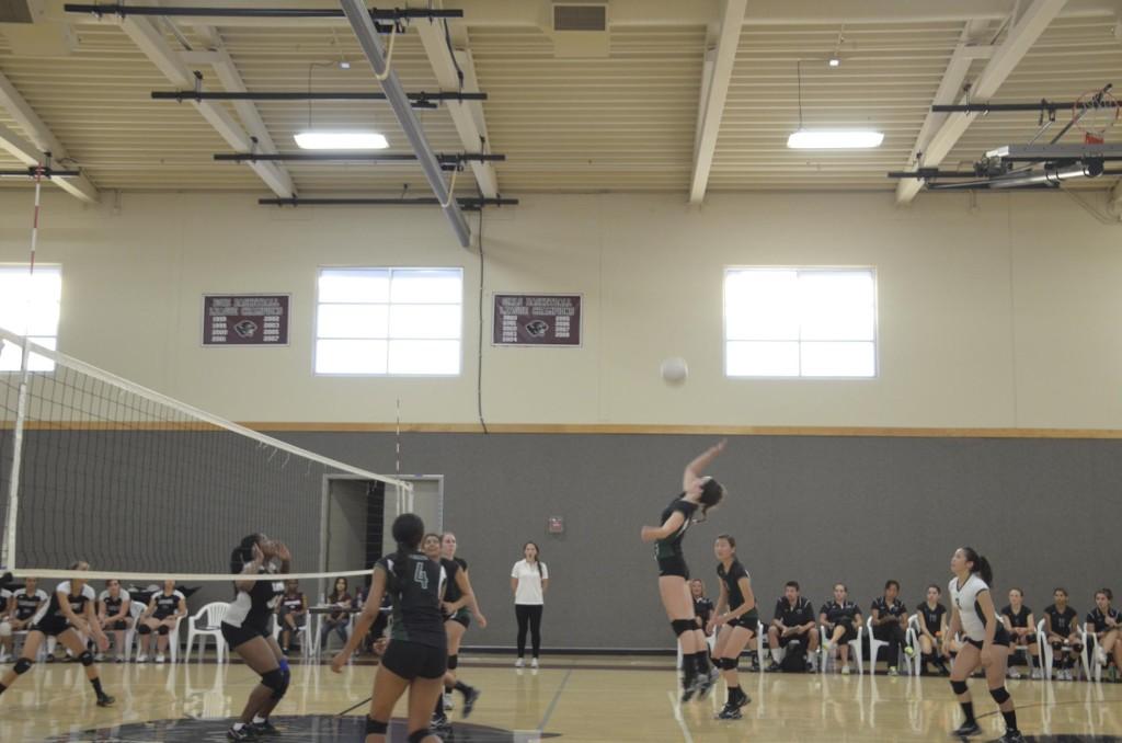 Freshman outside hitter Shannon Richardson leaps to execute one of her three kills in the game. She had the second highest number of kills in the game, following Shreya Dixit (11) who had six.