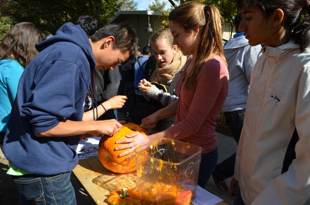 Several sophomores participate in the annual pumpkin carving event. The seniors placed first, followed by the juniors, freshmen, and sophomores.