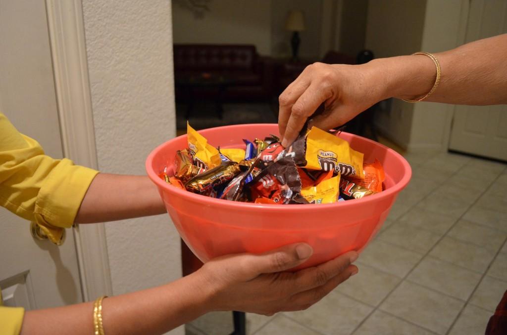 Enjoy the candy without trudging from door to door; consider celebrating Halloween by throwing a party, hosting a horror movie marathon, setting up a haunted house, attending a theme-park, or getting some much needed rest.