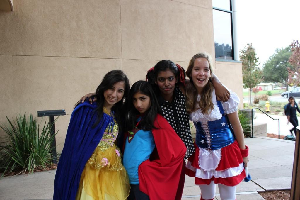 A group of freshmen have dressed up as different characters for Halloween. On the second day of Homecoming Week, many students and faculty celebrated Halloween with diverse costumes and decorations.