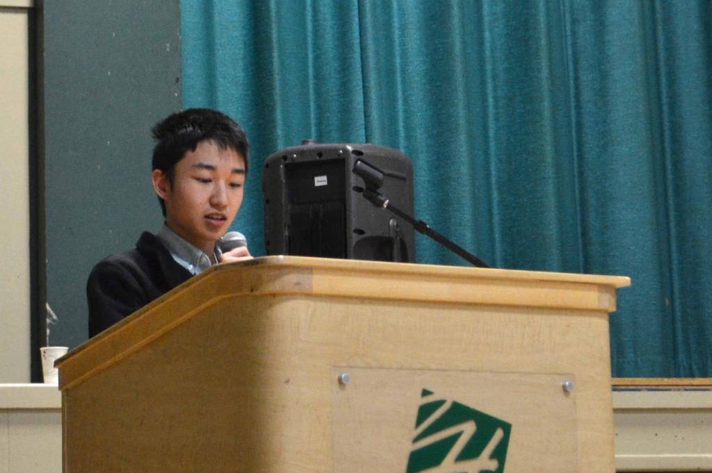 ASB Treasurer Kevin Lin (12) discusses the initiation of the student breakfast program during Monday's school meeting. The breakfast menu is expected to include hot items as well as cold snacks such as yogurt and muffins.