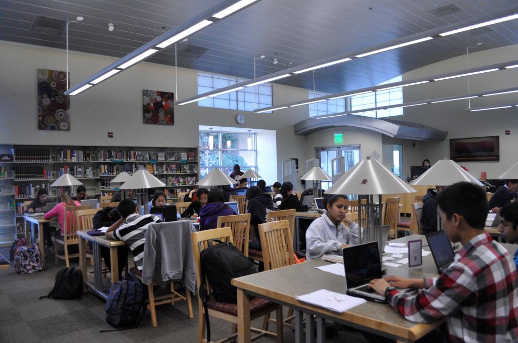 Students prepare for upcoming finals in the library after school. According to head librarian Lauri Vaughan, the library is usually filled up during most lunches and mornings during finals week. She hopes to create a quiet, focused environment for students.
