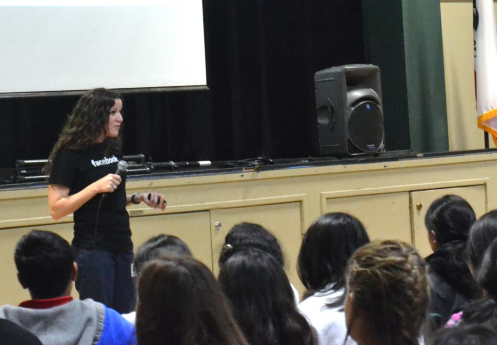 Krista Kobeski talks to the students about online security and protecting their Facebook accounts. Sophomores and freshmen filed into the gym for their LIFE assembly.