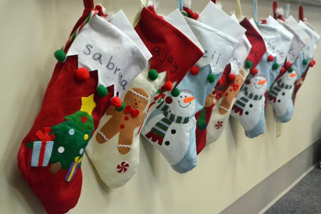 Math teacher Lola Muldrew’s advisory participates in the Secret Santa tradition, giving each other gifts inside stockings. Many groups on campus similarly enjoyed giving and receiving presents before the holiday break.