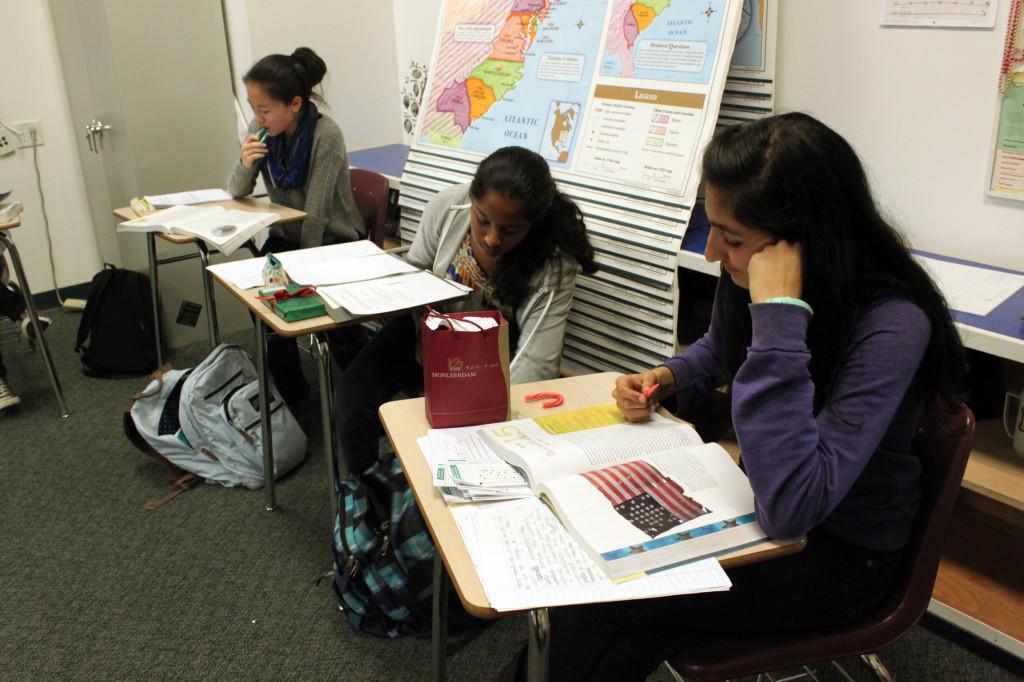 Juniors Jennifer Dai, Silpa Karipineni, and Renu Singh study for finals during an extra help added to the Wednesday schedule. Students were given time to prepare for upcoming exams with more extra helps allocated throughout this week.