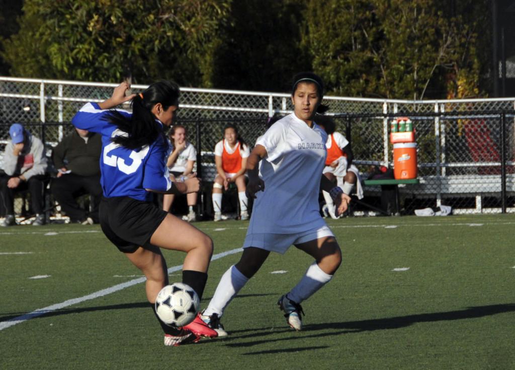 Sophomore Gabi Gupta kicks the ball past ICAs defender in a game on Friday, January 18. The Eagles’ victory over ICA improves their overall record to 4-5-1 and 3-1-1 in league play.