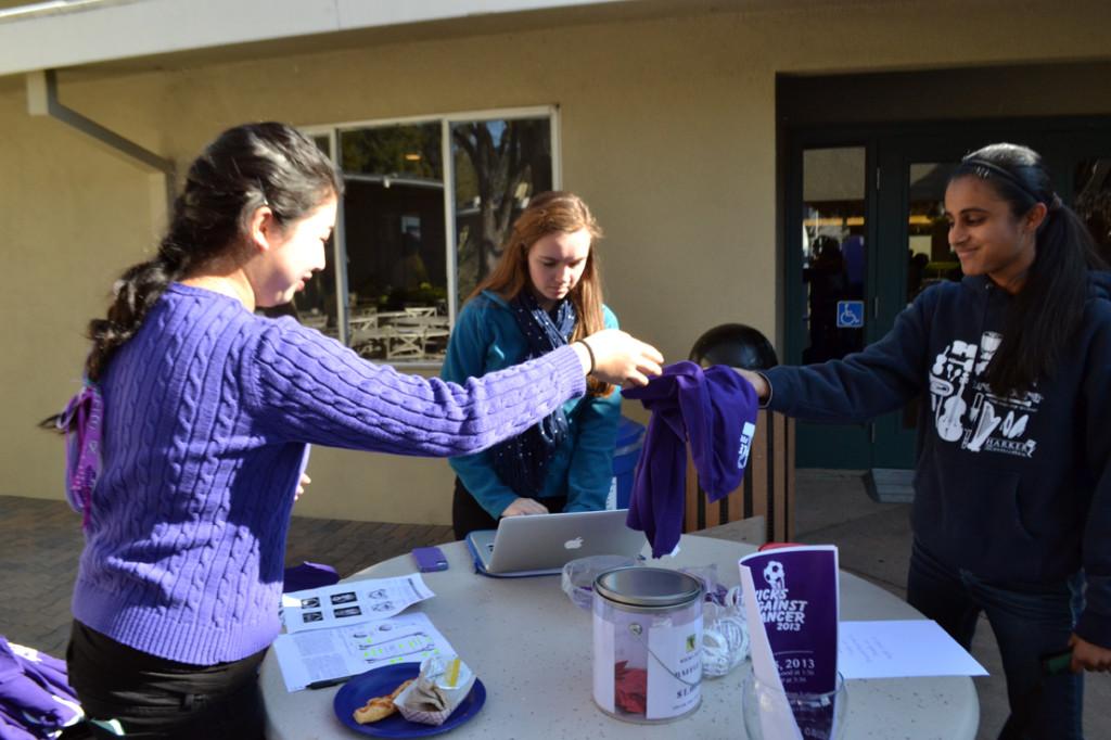 Senior captains of the girls Varsity soccer team Wendy Shwe and Amy Gendotti sell a Kicks Against Cancer T-shirt during lunch. The girls will be playing against Eastside College Prep on January 25 when more sales will be taking place.