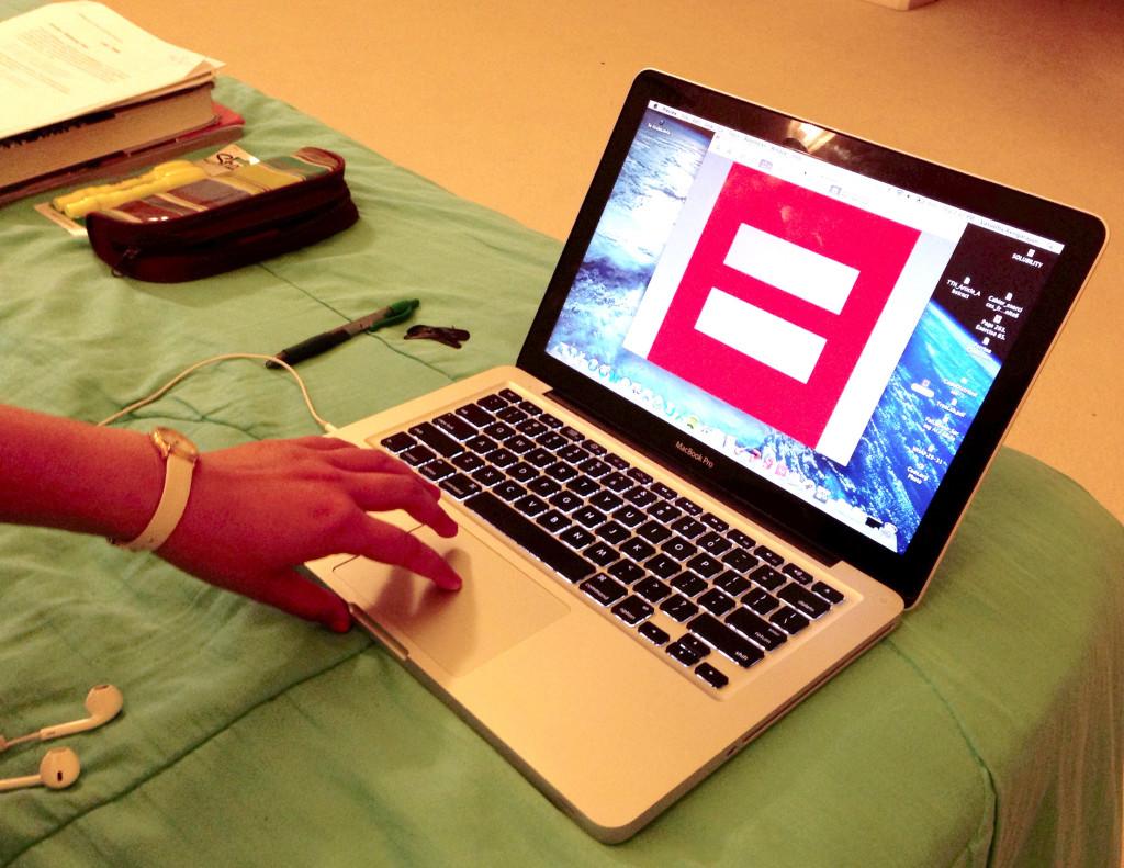 Showing growing support for the legalization of marriage, students rapidly download and share the symbol of marriage equality. Upper School seniors Laura Pedrotti and Pranav Sharma felt that changing their facebook profile pictures was important for a sense of unity and solidarity in the community.