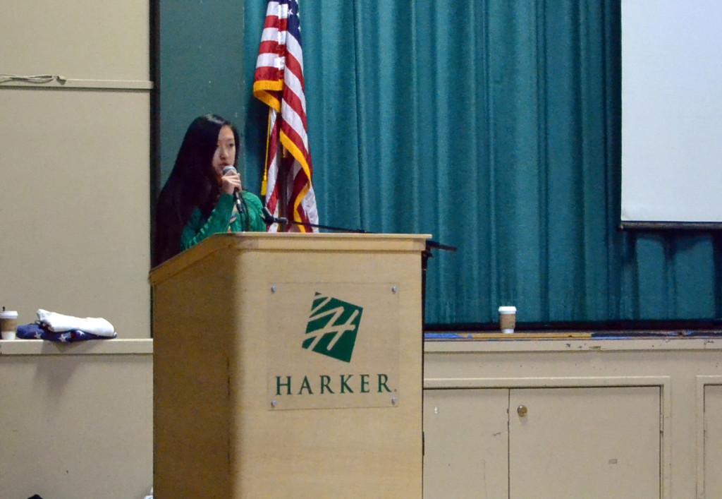 Senior Alice Tsui gives the second senior speech during school meeting today, April 8. She encouraged the school community to move past judgments and instead focus on the happy things that really matter.