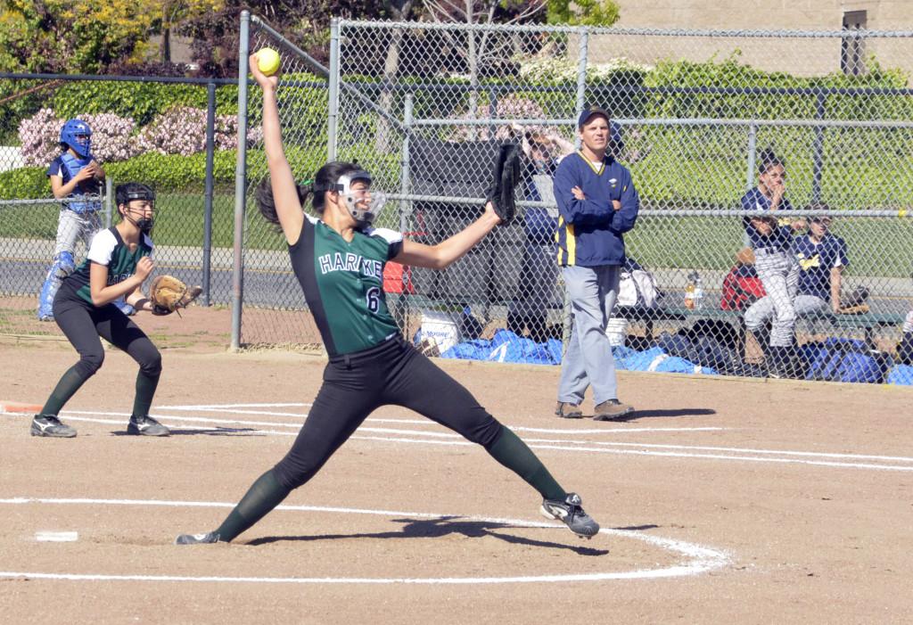 Senior+Alison+Rugar+throws+the+ball+with+speed+and+force+towards+Alma+Heights+batters.+The+majority+of+Alisons+pitches+in+todays+game+resulted+in+strikeouts%2C+resulting+in+87+total+strikeouts+for+her+so+far+this+season.