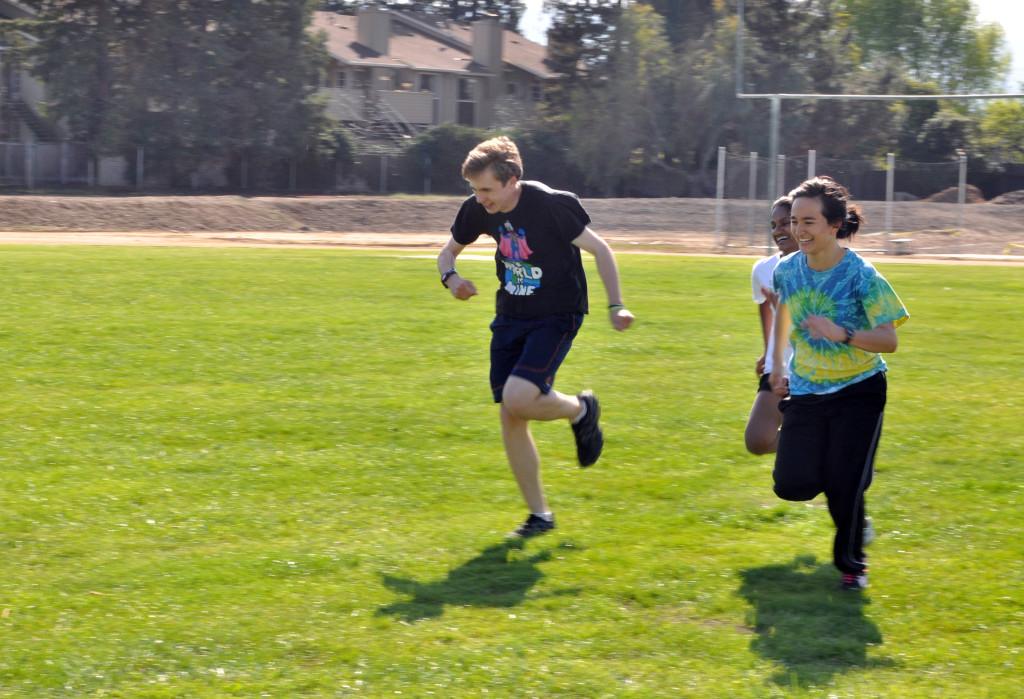 Junior Claudia Tischler (right) runs with other track and field athletes during practice. Claudia qualified for three running events for the Central Coast Section (CCS) Track and Field Preliminaries to be held at Gilroy High School this Saturday.