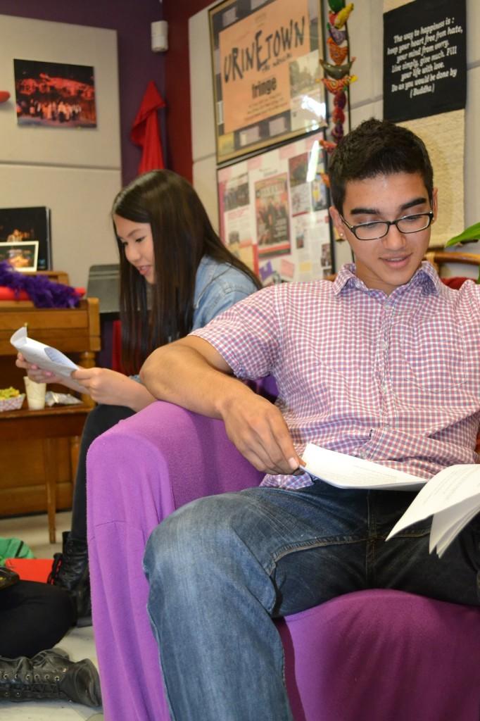 Janet Lee (10) and Vishal Vaidya (11), smile during a read-through of senior Shenel Ekicis showcase The Wonderful World of Dissocia. Read-throughs offered an opportunity for student directors to better visualize their shows and potential performers to decide which shows sparked their interest.