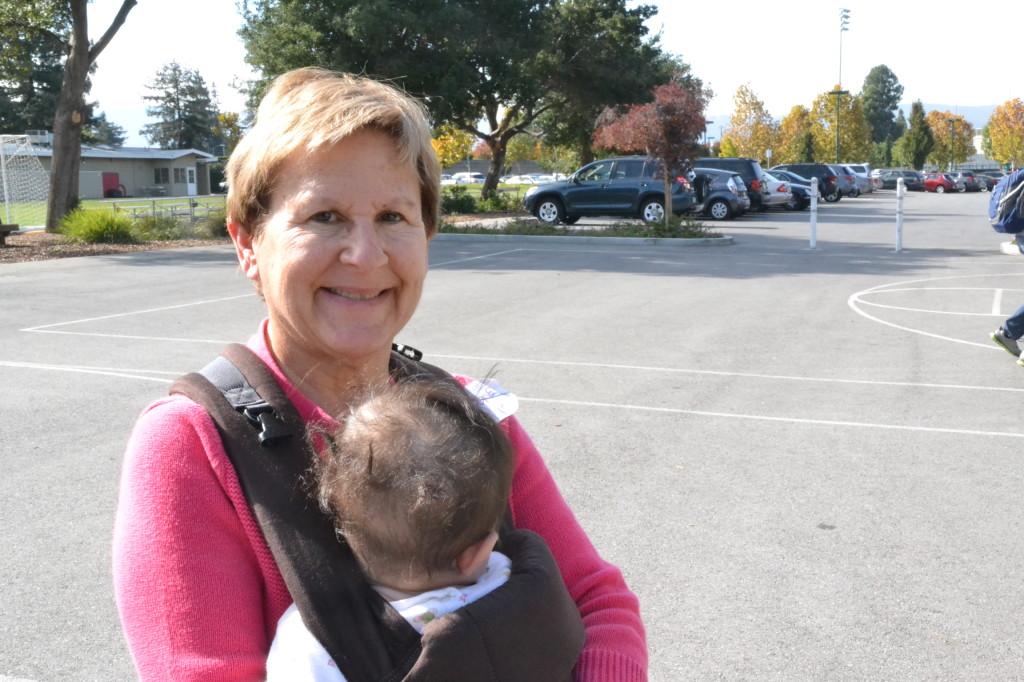 Marcia Lepler holds her seven month old graddaughter, Maya. The students in AP Psychology spent time playing with babies to understand their cognitive abilities.