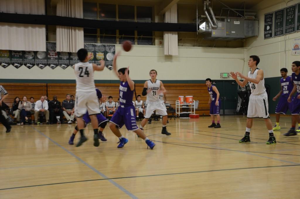 Nick Nguyen (11) passes to Eric Holt (11). The Eagles went on to win 59-42.