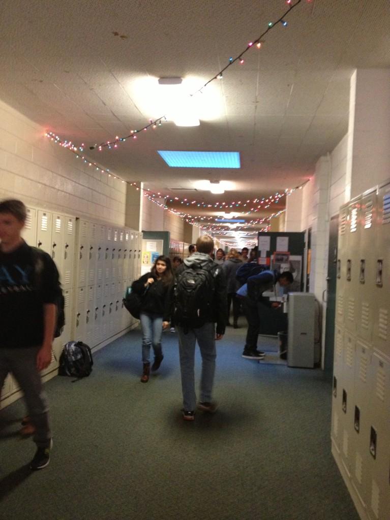 Students walk through the Main, decorated with Christmas lights by ASB over break. A large Christmas tree will be put up in the quad later this week.
