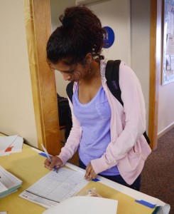 Gabriela Gupta (11) signs up for the Red Cross's annual blood drive. It will take place on February 5 from 8:30 am to 2:30 pm.  