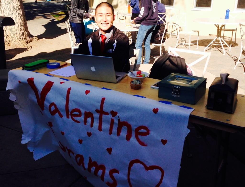 ASB Secretary Vincent Lin sells Valentine grams at lunch. Roses cost three dollars while chocolate boxes cost six.