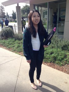 Helen Xie(10) wear layers of T-shirts and jackets on a sunny California day.