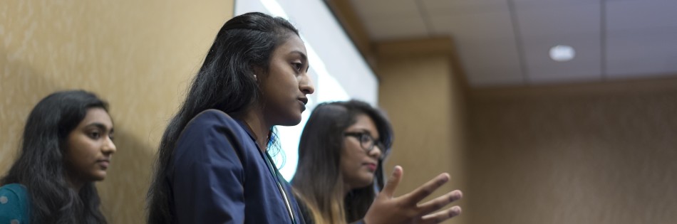 Juniors Juhi Gupta and Vasudha Rengarajan answer questions about keeping the flow of news constant on a news site in their presentation at the NSPA convention in San Diego.