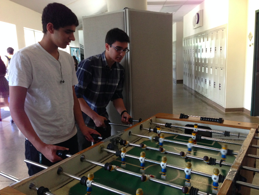 Juniors Mohannad Khadr and Vishal Vaidya play foosball in Shah during their break. Nikhil Reddy announced that the first-ever Varsity Foosball Tournament will be held towards the end of this school year. 