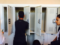 Students clean out their lockers, leaving the emptied lockers open for inspection. Locker cleanout was during advisory period on Thursday.

