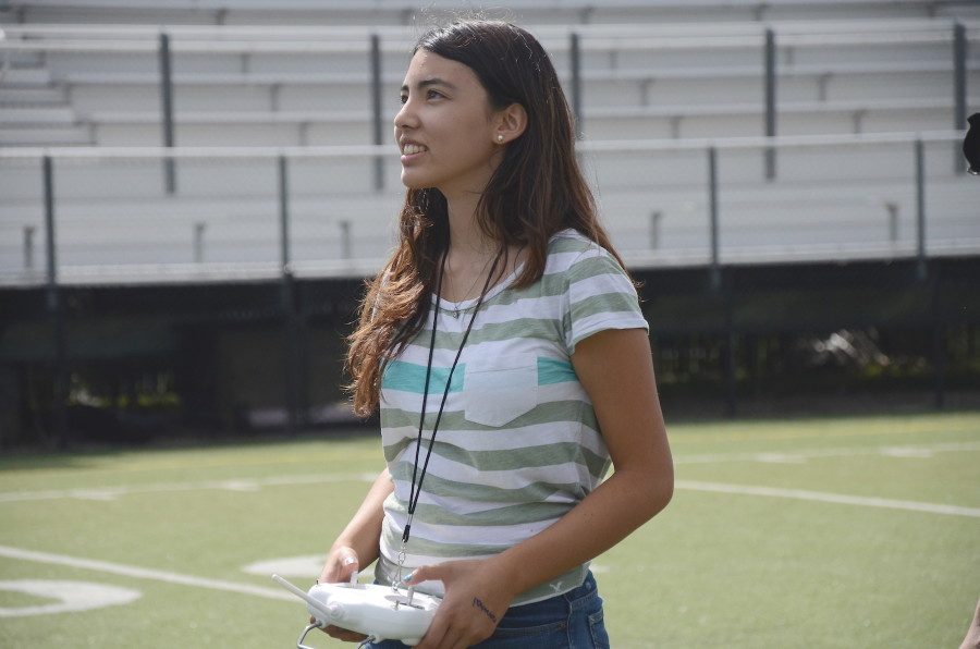 Under the guidance of Eric Marten, the journalism students tested the drone for the first time today on Davis Field. 