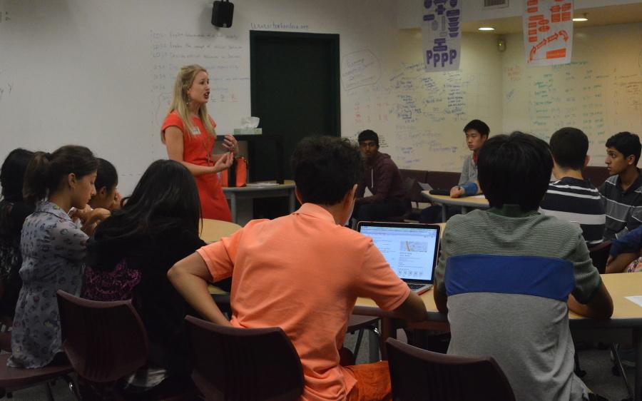 Speaker Michelle Vitus breaks down the important components of a professional resume to students in the Innovation Center. Vitus was invited by Laya Indukuri (12), who knew Vitus job description and thought she would be very informative for students.