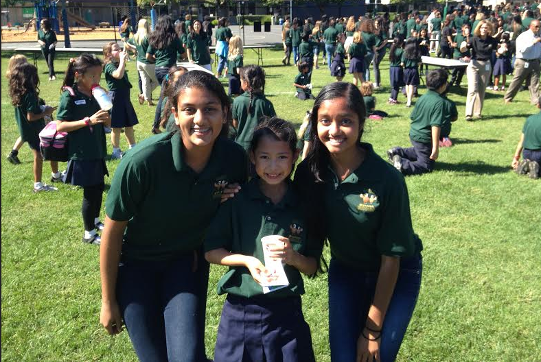 Sophomores Chetana Kalidindi and Sneha Bhetanabhotla smile with their eagle buddy. The class of 2017 travelled to the Bucknall campus to visit their eagle buddies for the first time on Thursday.
