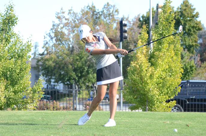 Vienna Wang (10) swings at the ball. The teams current season record as of Oct. 13 is 4-2-1.