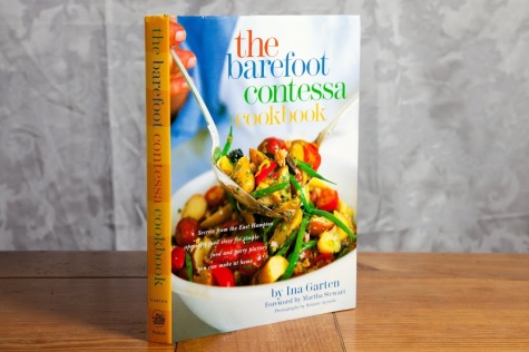 "The Barefoot Contessa" by Ina Garten is the perfect gift for anyone who loves cooking. The recipient of this gift may even treat you to a meal or two from this cookbook.