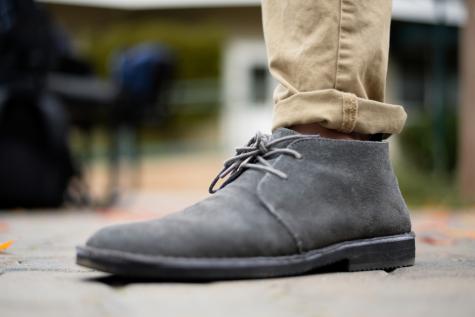 Alex Jang (12) models a pair of gray chukka boots. These can be worn both in daily life and at more formal events. 
