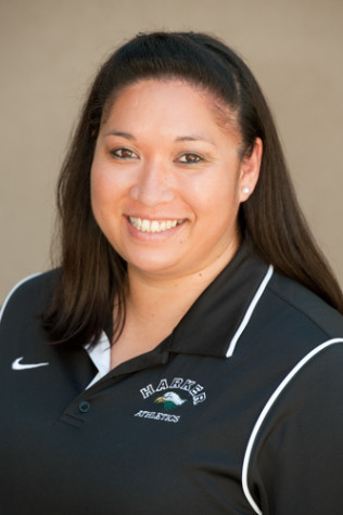 Varsity swim team welcomes new coach
