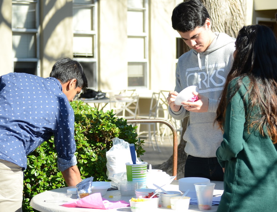 Students buy Pinkberry outside Manzanita during lunch. The Make a Birthday Wish club is selling frozen yogurt and baked goods this week to fundraise. 