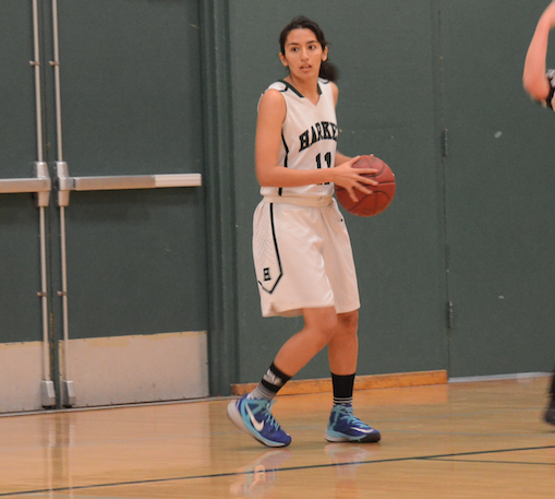 Shreya Basu (12) looks to pass the ball to a teammate. Harker defeated Woodside Priory 64-46.