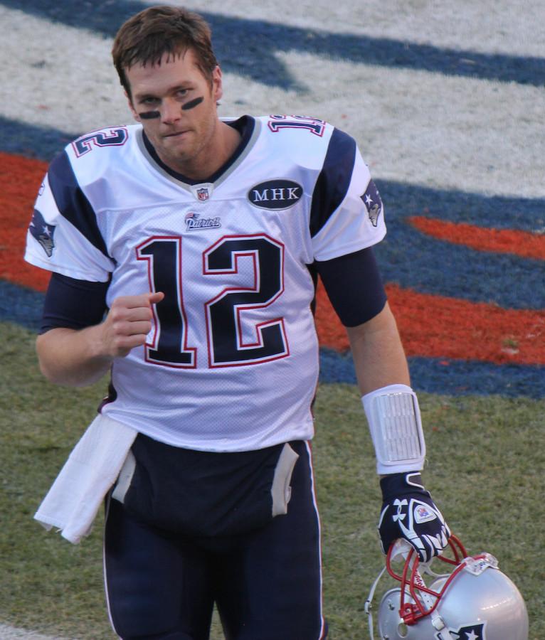 Tom Brady walks off the field after playing the Denver Broncos. Brady has been playing in the NFL since 2000.
