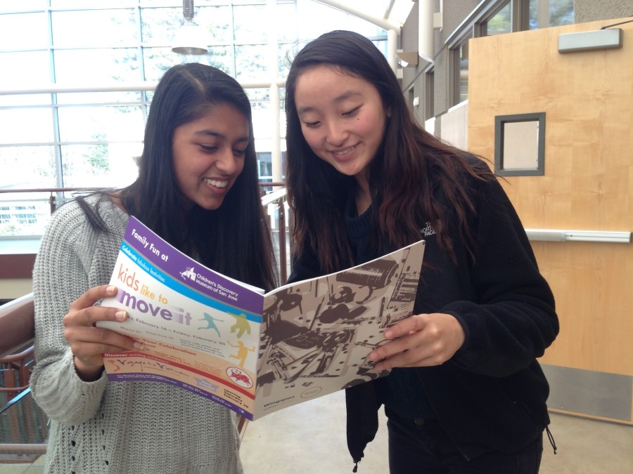 Sophomores Anuva Mittal and May Gao read an article in Wingspan. The first issue of the Upper Schools new long-form magazine released today.