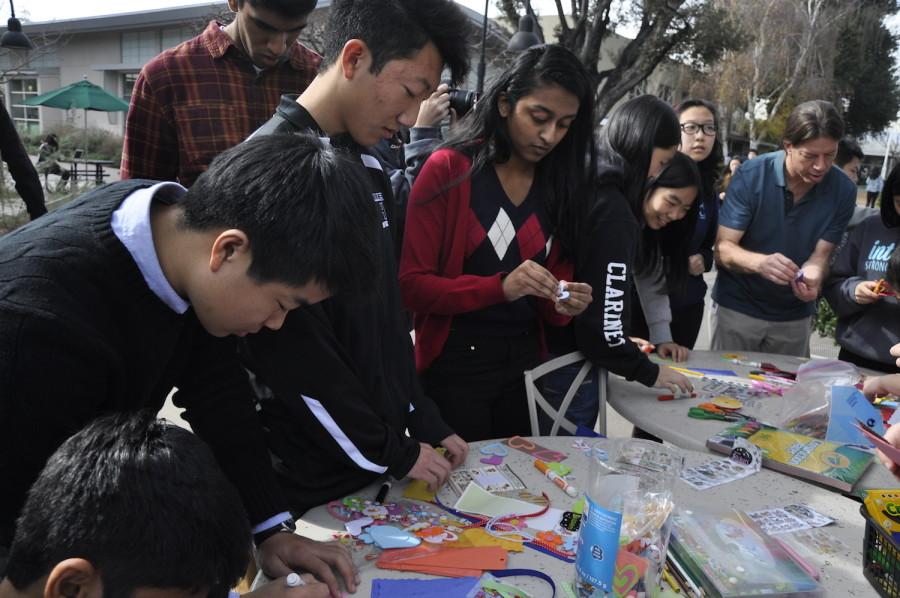  Students gather outside of Manzanita to create bookmarks for the FemInterKey fundraiser. FEM, Interact, and Key clubs joined together to support Students Rebuild’s Literacy Challenge, which donates $2 for every bookmark made. 