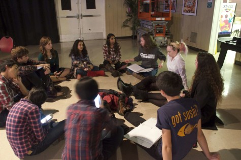 The cast of "Almost Maine" runs through lines. Caroline Howell (12) directed this play.