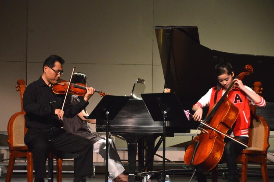 Nana practices with violinist Ryan Chen and Jo-Hwa Yao before the concert. She performed at a United States International Music Competition Benefit Concert on March 21.  