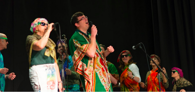Teachers perform The Lion Sleeps Tonight in the 2014 HOSCARS show. Teachers perform each year in HOSCARS.
