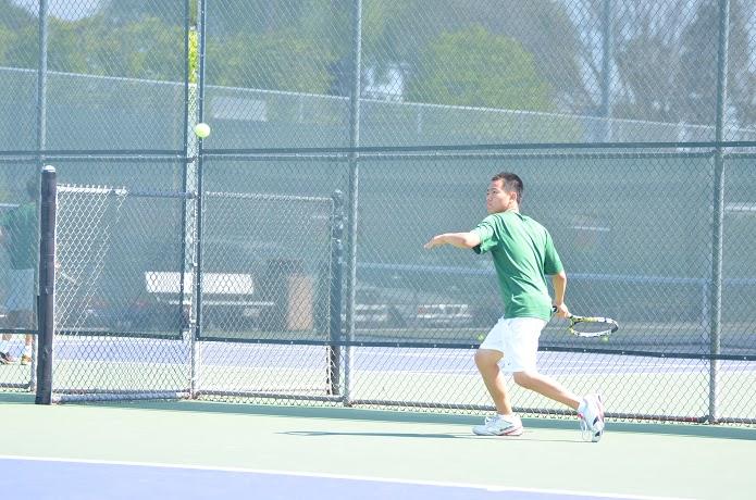 Albert Pun (10) prepares to hit a forehand. He and Edward Tischler won their doubles match against SHP.