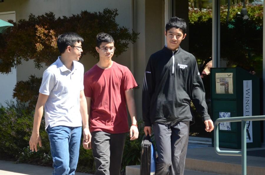 Alexander Lam (10) and Sandip Nirmel (10) sport clothing acceptable pre-dress code changes, while Rishab Gargeya (10) wears a plain, crew-neck T-shirt now permitted with the new dress code. Collar-less T-shirts are a new addition to the dress code. The dress code will continue its trial period until May 31. 