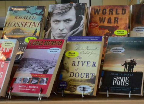 “A World Destroyed” by Martin J. Sherwin sits on a shelf alongside other book choice available for students. Upper School history teacher Tim Case will sponsor the book this year.