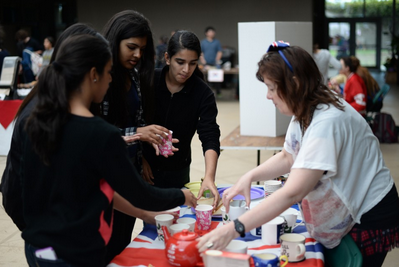 Students try food at the 2014 GEO fair. This years GEO fairs date is set to take place at the end of April.