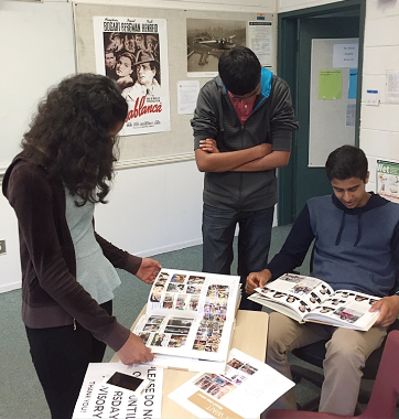 Raveena Kapatkar (10), Rishi Maheshwari (10) and Shekar Ramaswamy (10) peruse But Wait...theres more during advisory. By the time the three had reached advisory, Talons staff had already delivered copies of the yearbook to their advisor Ohad Paran.